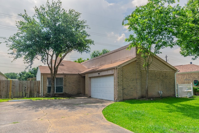 6930 Caddo Lake Ln, Houston, TX 77083 - single story home with brick siding, a garage, and concrete driveway