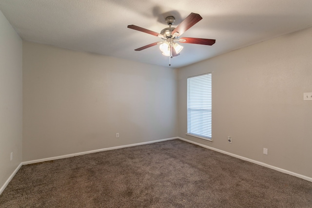 6930 Caddo Lake Ln, Houston, TX 77083 - empty room featuring dark colored carpet and a ceiling fan