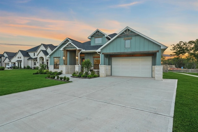 4215 Wooded Isle Way, Fulshear, TX 77441 - craftsman-style home with board and batten siding, stone siding, driveway, and a front yard