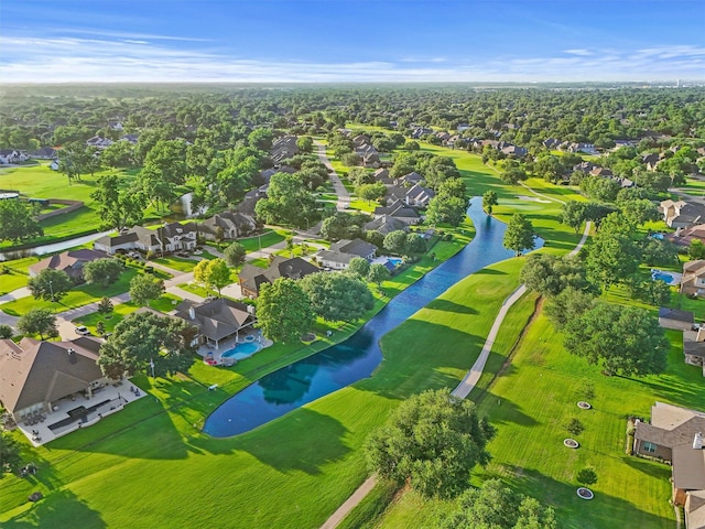 4215 Wooded Isle Way, Fulshear, TX 77441 - aerial view of residential area featuring a large body of water and a local golf course