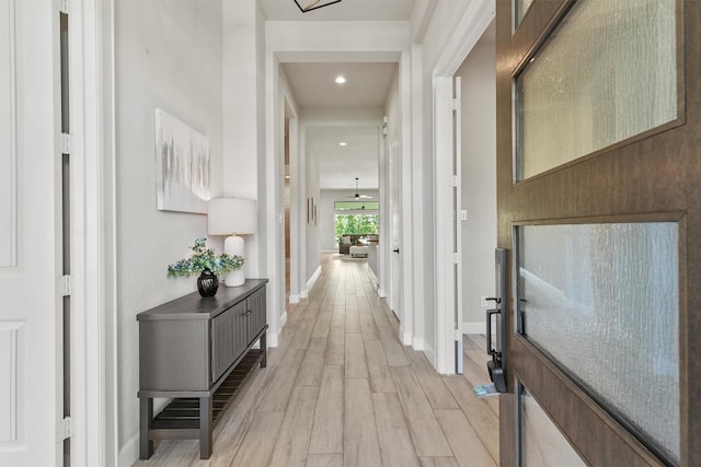 4215 Wooded Isle Way, Fulshear, TX 77441 - hall with light wood finished floors, recessed lighting, and baseboards
