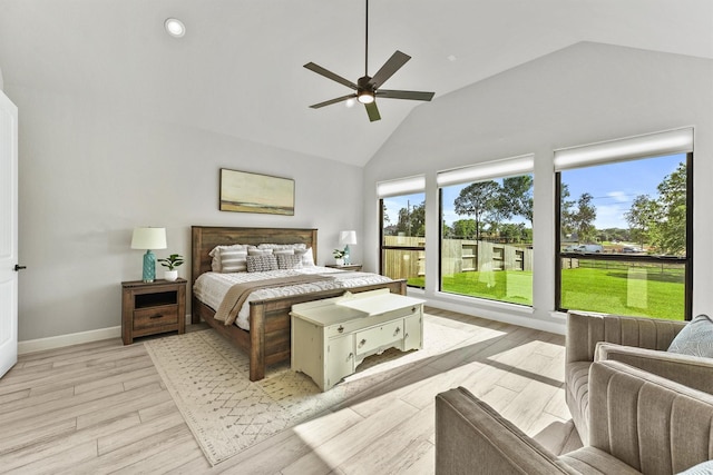 4215 Wooded Isle Way, Fulshear, TX 77441 - bedroom featuring light wood-style flooring, high vaulted ceiling, baseboards, a ceiling fan, and recessed lighting