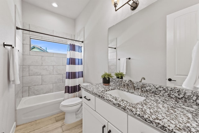 4215 Wooded Isle Way, Fulshear, TX 77441 - bathroom featuring vanity, toilet, shower / tub combo, and wood finished floors