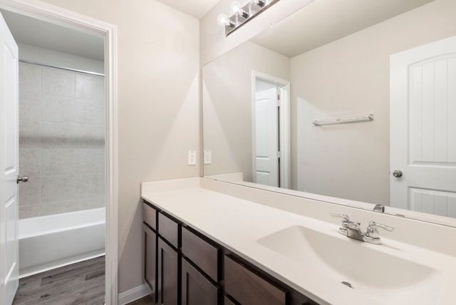 4438 Stephanie Park Ln, Conroe, TX 77304 - bathroom with vanity, wood finished floors, and shower / washtub combination