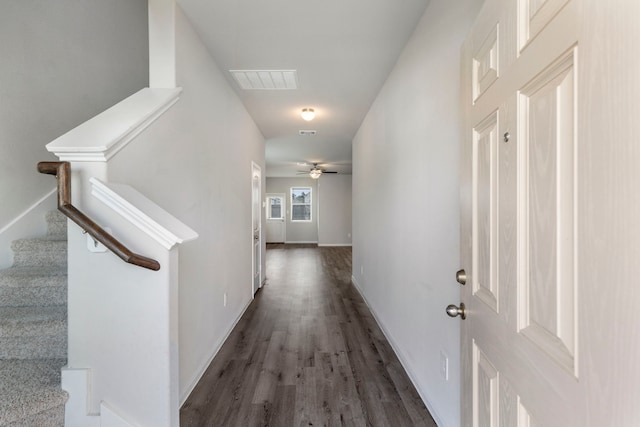4438 Stephanie Park Ln, Conroe, TX 77304 - hall with wood finished floors and stairs