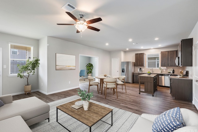 4438 Stephanie Park Ln, Conroe, TX 77304 - living room featuring light wood-type flooring, ceiling fan, and recessed lighting