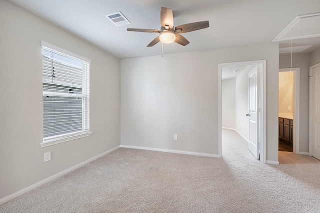 4438 Stephanie Park Ln, Conroe, TX 77304 - carpeted empty room with attic access and ceiling fan