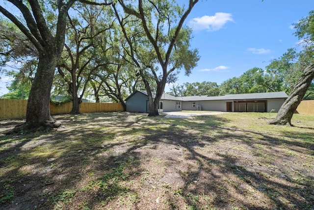 848 Nursery St, Clute, TX 77531 - view of yard with a patio