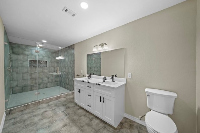 848 Nursery St, Clute, TX 77531 - full bathroom with double vanity, toilet, a stall shower, baseboards, and recessed lighting