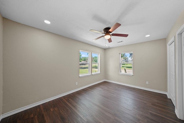 848 Nursery St, Clute, TX 77531 - unfurnished bedroom featuring dark wood finished floors, baseboards, ceiling fan, and recessed lighting