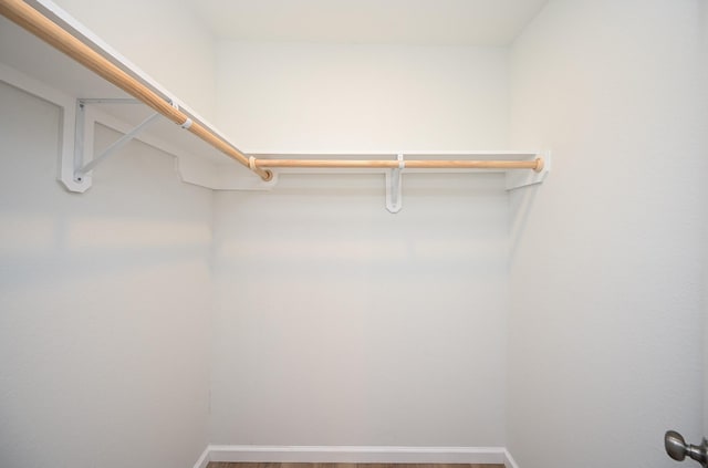 9510 Chesterfield Dr, Houston, TX 77051 - walk in closet with wood finished floors