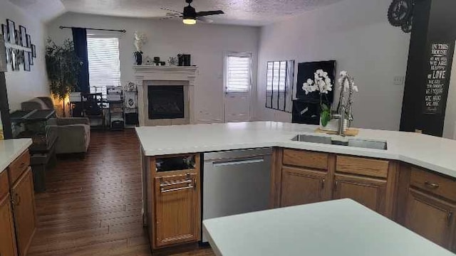 11411 Sugarbush Ridge Ln, Houston, TX 77089 - kitchen with open floor plan, dark wood finished floors, stainless steel dishwasher, light countertops, and plenty of natural light