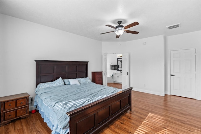 11411 Sugarbush Ridge Ln, Houston, TX 77089 - bedroom featuring wood finished floors and a ceiling fan