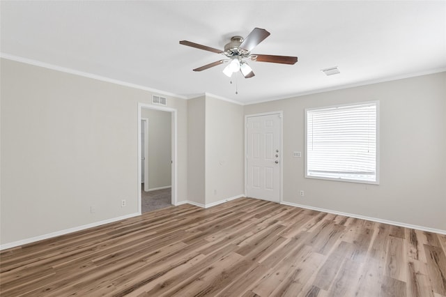 21430 Cherry Canyon Ln, Tomball, TX 77375 - unfurnished room with ornamental molding, light wood-style floors, ceiling fan, and baseboards