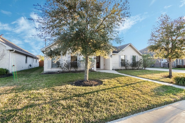 2119 Eagar Rd, League City, TX 77573 - view of front of property with a front lawn and brick siding