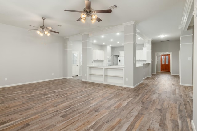 2119 Eagar Rd, League City, TX 77573 - unfurnished living room featuring ceiling fan, light wood-type flooring, baseboards, and recessed lighting