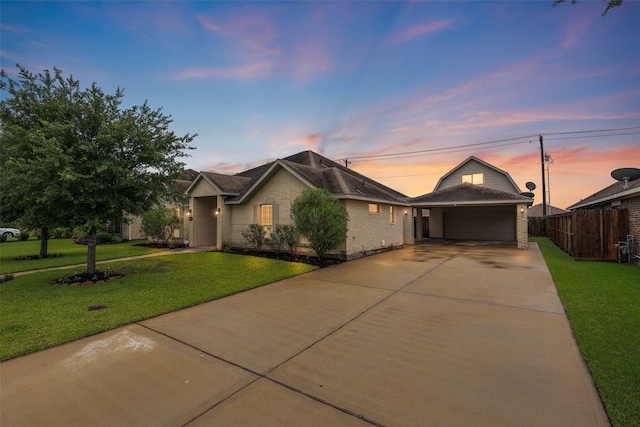 2119 Eagar Rd, League City, TX 77573 - view of front of house featuring driveway, brick siding, and a garage
