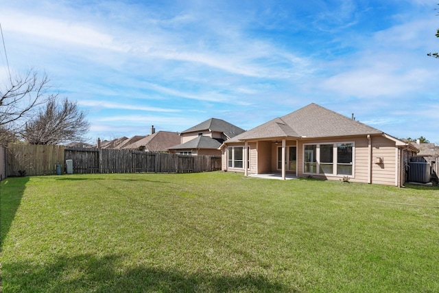 23135 Tranquil Springs Ln, Katy, TX 77494 - back of property featuring a patio, central AC, a ceiling fan, and a shingled roof