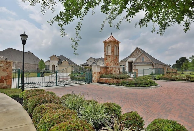 8823 Leaning Hollow Ln, Spring, TX 77379 - view of community featuring a gate and a residential view