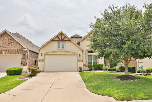 8823 Leaning Hollow Ln, Spring, TX 77379 - tudor house featuring concrete driveway, a front yard, stone siding, and brick siding