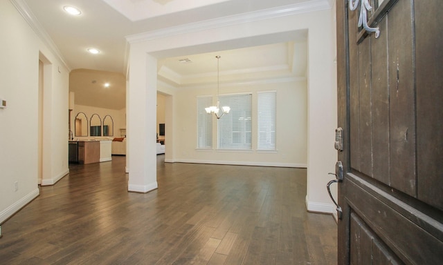 8823 Leaning Hollow Ln, Spring, TX 77379 - entryway featuring a chandelier, dark wood-style flooring, a raised ceiling, recessed lighting, and ornamental molding