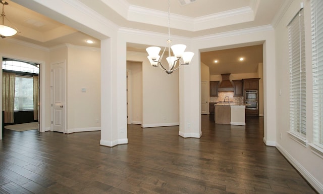 8823 Leaning Hollow Ln, Spring, TX 77379 - unfurnished dining area with a raised ceiling, dark wood finished floors, a chandelier, ornamental molding, and recessed lighting