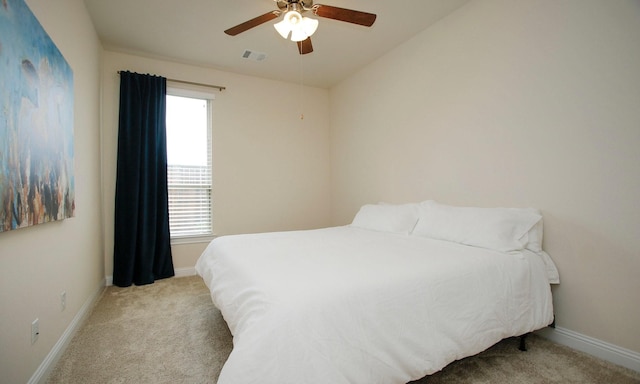 8823 Leaning Hollow Ln, Spring, TX 77379 - bedroom featuring light colored carpet and ceiling fan