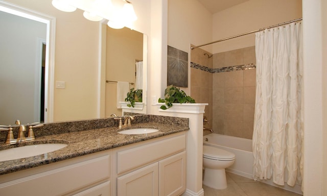 8823 Leaning Hollow Ln, Spring, TX 77379 - full bath featuring double vanity, tile patterned floors, and shower / bath combination with curtain