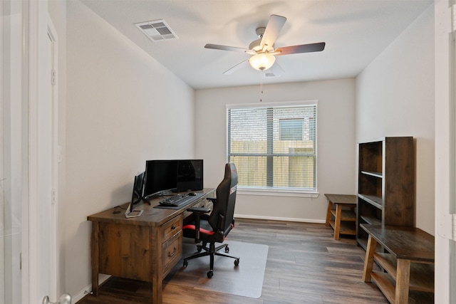 235 Crest Edge St, Montgomery, TX 77316 - office space featuring wood finished floors, ceiling fan, and baseboards