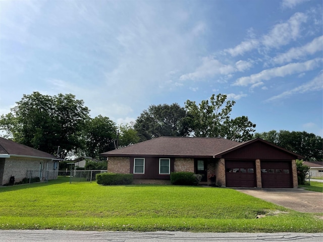 1733 Brumbelow St, Rosenberg, TX 77471 - ranch-style home with a garage, brick siding, and concrete driveway