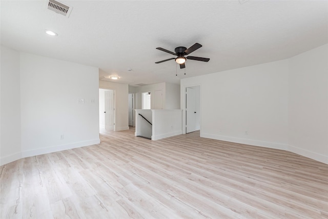 12034 Audubon Hill Ct, Houston, TX 77038 - spare room featuring baseboards, light wood-type flooring, a ceiling fan, and recessed lighting