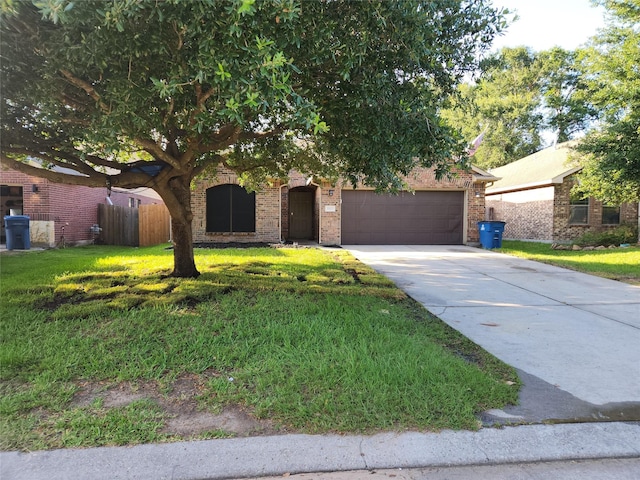 19103 Painted Blvd, Porter, TX 77365 - view of property hidden behind natural elements with driveway, brick siding, and a garage