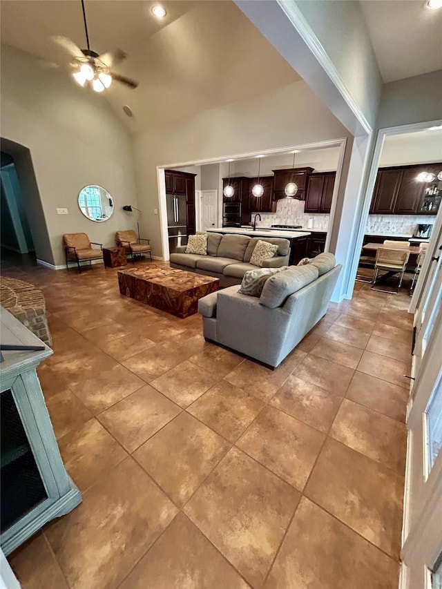 15127 Turquoise Mist Dr, Cypress, TX 77433 - living area featuring ceiling fan, light tile patterned floors, recessed lighting, and high vaulted ceiling