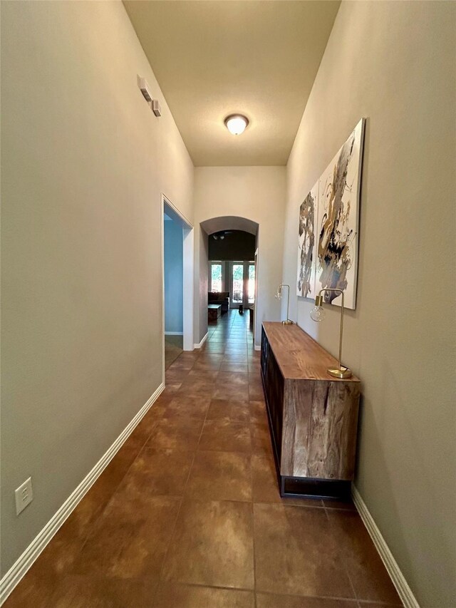 15127 Turquoise Mist Dr, Cypress, TX 77433 - corridor featuring arched walkways and baseboards