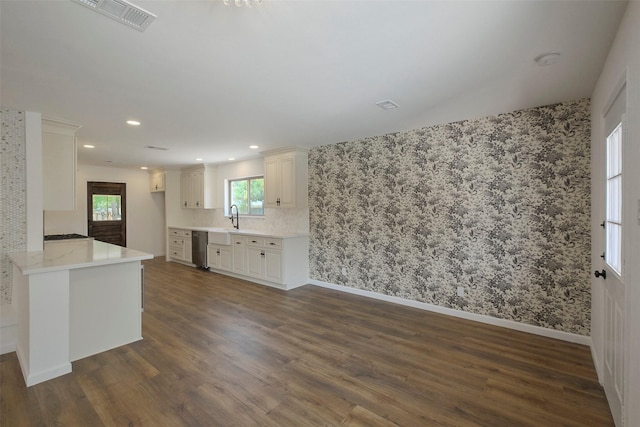 2742 Triway Ln, Houston, TX 77043 - unfurnished living room featuring wallpapered walls, dark wood-style flooring, a sink, recessed lighting, and baseboards