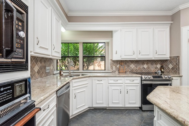 9410 Windrush Dr, Spring, TX 77379 - kitchen with appliances with stainless steel finishes, a sink, white cabinets, crown molding, and light stone countertops