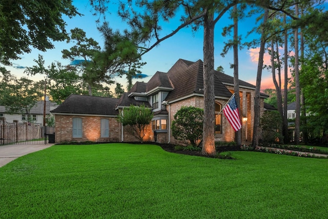 9410 Windrush Dr, Spring, TX 77379 - english style home featuring brick siding