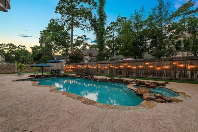 9410 Windrush Dr, Spring, TX 77379 - view of pool with an in-ground hot tub and a patio area