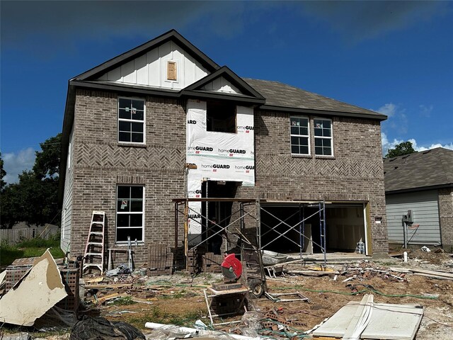 3508 Monroe St, Bay City, TX 77414 - back of property with brick siding, board and batten siding, and an attached garage