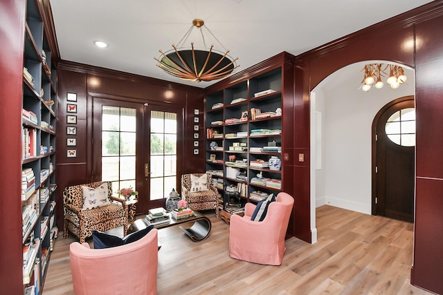 7153 Fm 1458th Rd, Sealy, TX 77474 - sitting room with arched walkways, ornamental molding, wood finished floors, baseboards, and recessed lighting
