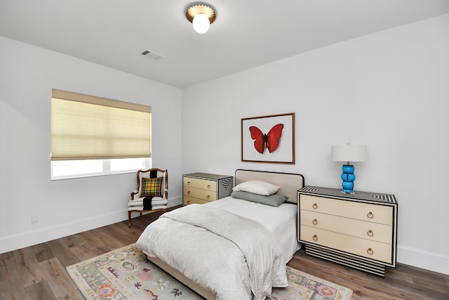 7153 Fm 1458th Rd, Sealy, TX 77474 - bedroom featuring baseboards and wood finished floors