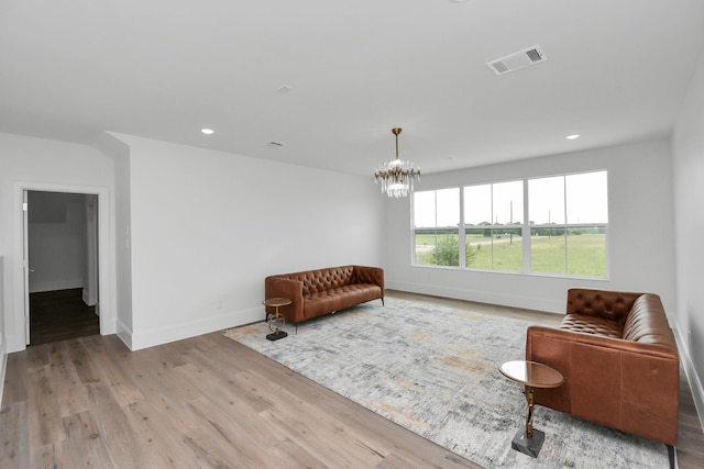 7153 Fm 1458th Rd, Sealy, TX 77474 - sitting room featuring baseboards, a chandelier, wood finished floors, and recessed lighting