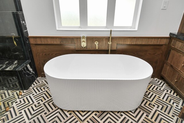7153 Fm 1458th Rd, Sealy, TX 77474 - bathroom view of a soaking tub and wainscoting