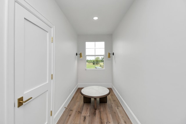 7153 Fm 1458th Rd, Sealy, TX 77474 - doorway featuring light wood-style flooring, baseboards, and recessed lighting
