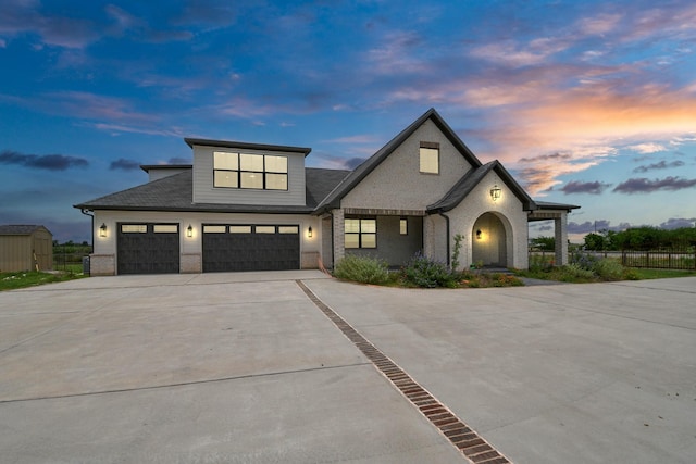 7153 Fm 1458th Rd, Sealy, TX 77474 - view of front facade featuring driveway, an attached garage, and brick siding