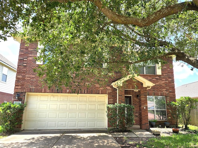 2623 Sable Ridge Ln, Katy, TX 77494 - traditional home with brick siding, concrete driveway, and a garage