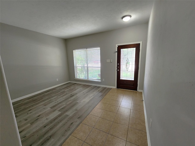 2623 Sable Ridge Ln, Katy, TX 77494 - entryway featuring baseboards and tile patterned floors