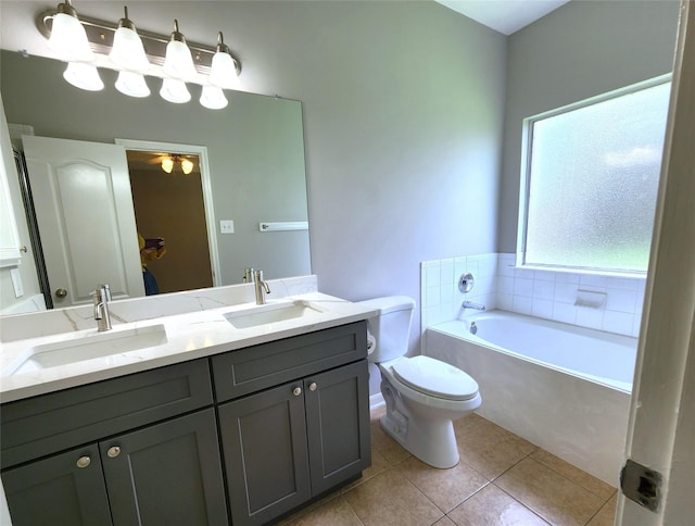 2623 Sable Ridge Ln, Katy, TX 77494 - full bath with double vanity, toilet, tile patterned floors, and a bath