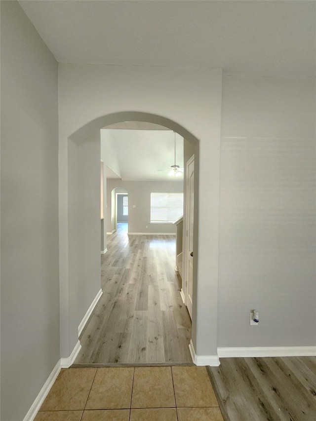 2623 Sable Ridge Ln, Katy, TX 77494 - hall featuring arched walkways and wood finished floors