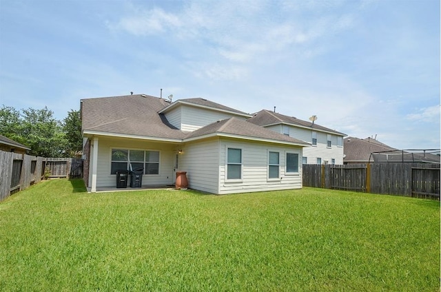 2623 Sable Ridge Ln, Katy, TX 77494 - back of property featuring a fenced backyard and roof with shingles